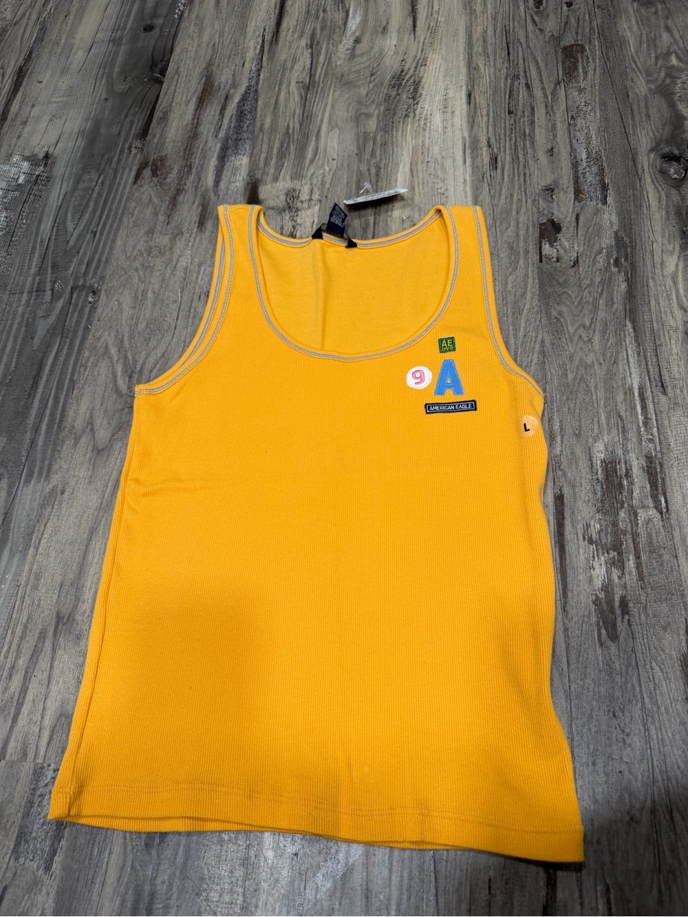 American eagle Y2K new with tags headstock! Yellow tank top L